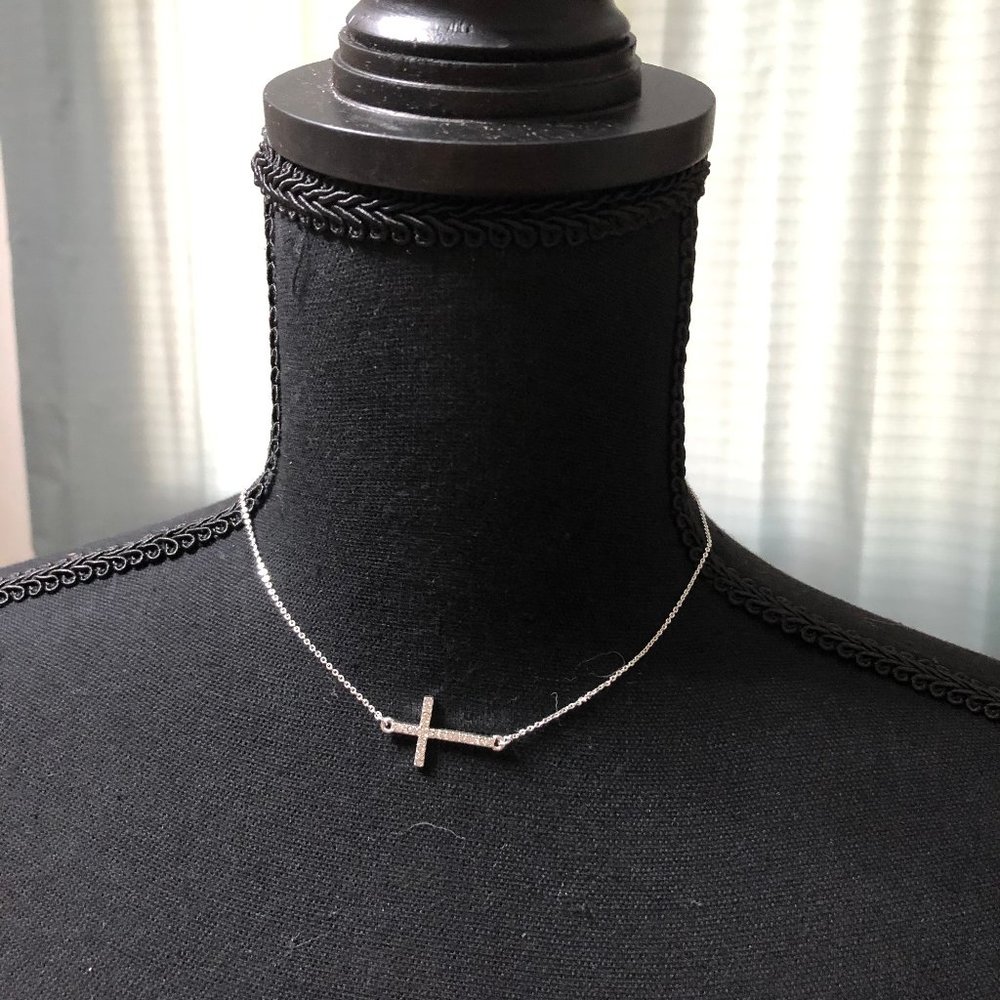 Express fallen cross necklace